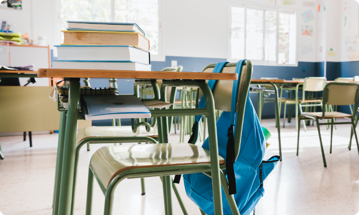 school-classroom-with-books-backpack