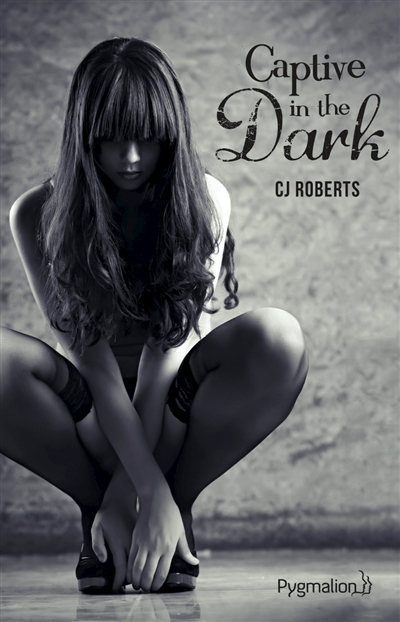 Captive in the dark | Roberts, C.J.